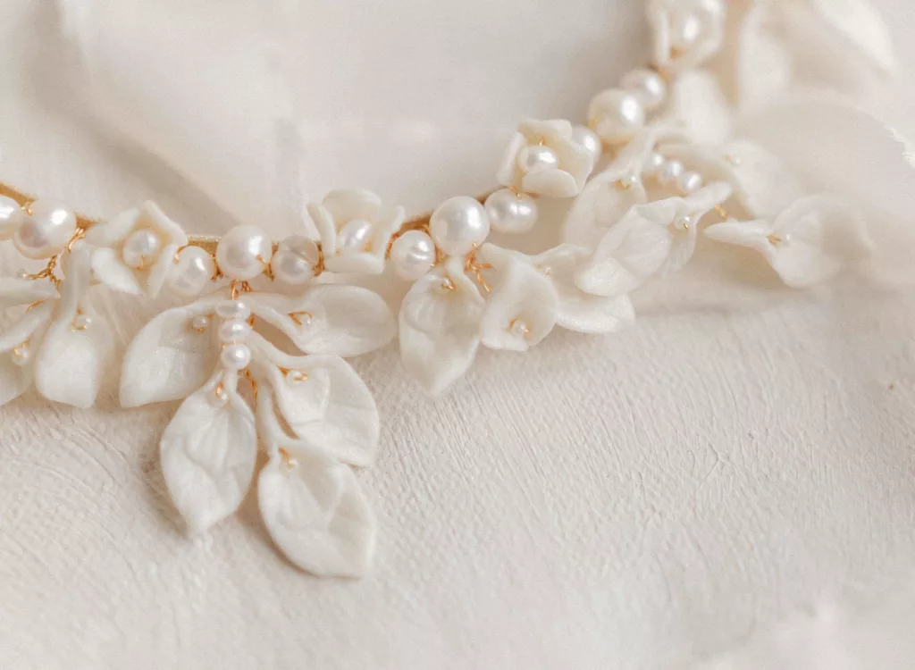 Modern luxury romantic wedding hair accessory with leaves and pearls